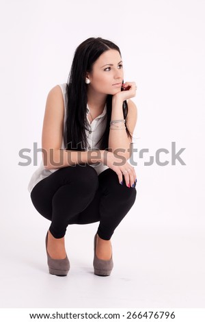 https://image.shutterstock.com/display_pic_with_logo/1509596/266476796/stock-photo-young-long-haired-black-haired-woman-squatting-thoughtful-266476796.jpg
