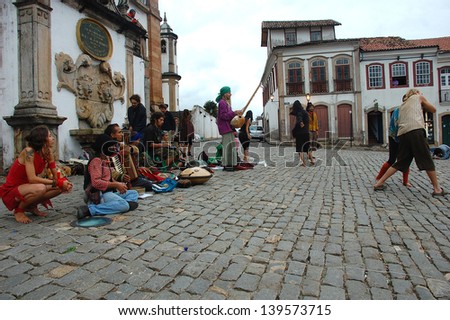 OURO PRETO, BRAZIL- MARCH 18 2012 :Members of  The Rainbow Family of Living Light  loosely affiliated group during a street exhibition in Ouro Preto, Minas Gerais ,Brazil    on 18 March 2012 .