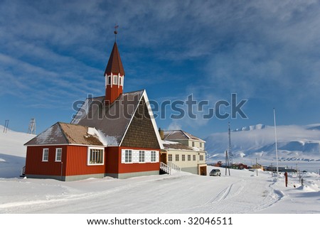 Amazing landscape with red Church, Longyearbyen of Spitsbergen in the Arctic North Pole region.
