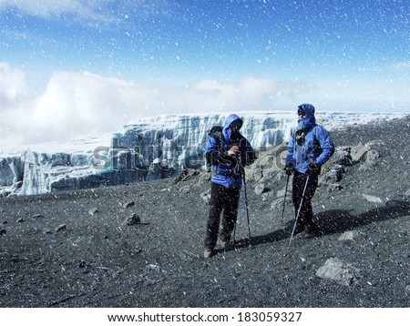 Mountaineers at Mt. Kilimanjaro, 5.895 m Uhuru Peak Africas highest mountain as well as worlds highest free-standing mountain. One of World`s Largest Volcanoes.