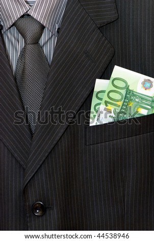 closeup of striped male suit with euro in a pocket
