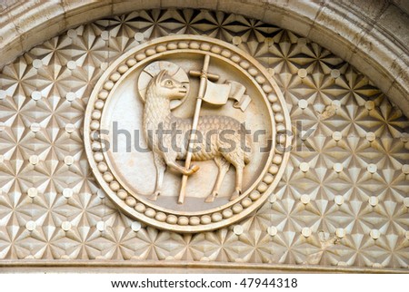 bass-relief of lamb with cross on a church wall in Jerusalem