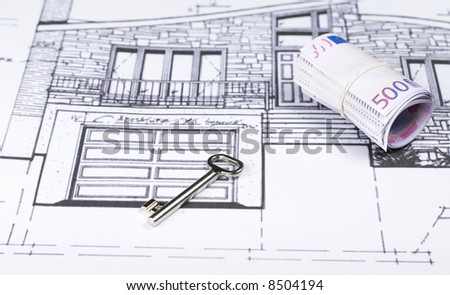 House key and money on Blueprint