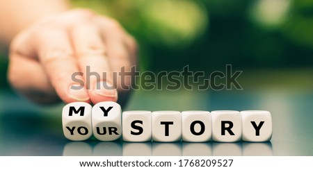 Hand turns dice and changes the expression 'your story' to 'my story'. Foto stock © 