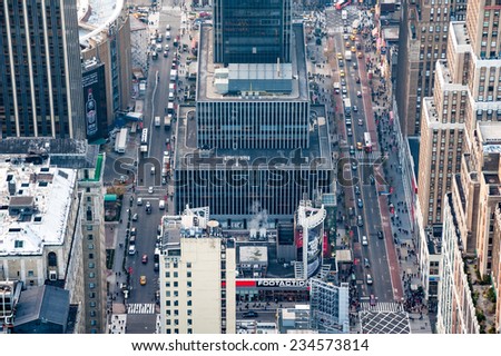 manhattan, circa dec 2011: classic aerial street view, people and skyscraper of manhattan in New york