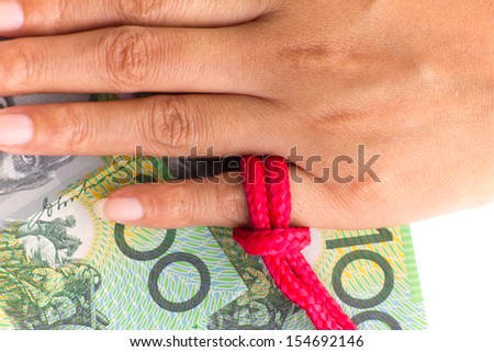 Stock Photo - open hand with red ribbon, don\'t forget