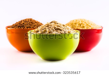 A wide range of cereals and food grains in color plates on a white background