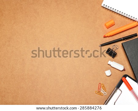 Still life, business, education concept. Office supplies, notepad, diary, marker, USB flash drive and pens on a table. Selective focus, copy space background, top view