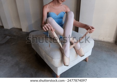 Similar – Image, Stock Photo Graceful ballerina and her male partner dancing elements of classical or modern ballet in dark with floodlight backlight. Couple in smoke on black background. Art concept.