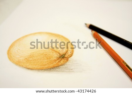 Picture of orange drawing and pencils