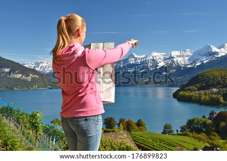 Girl looking to the map. Spiez, Switzerland
