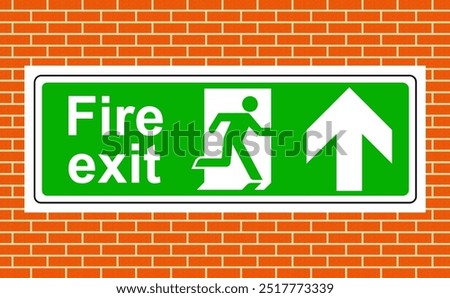 Fire exit up sign on the wall