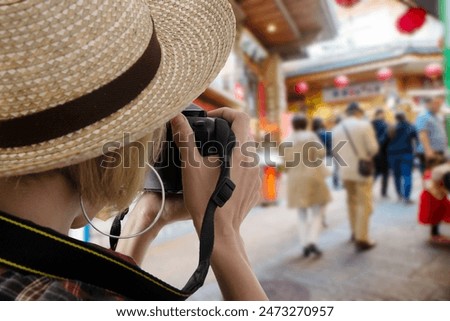 Similar – Image, Stock Photo Female tourist taking shot of sea in twilight