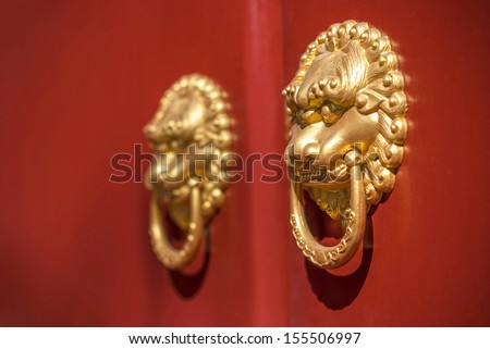 Ancient Chinese door knocker, located in Temple of Confucius, Harbin City, Heilongjiang Province, China.