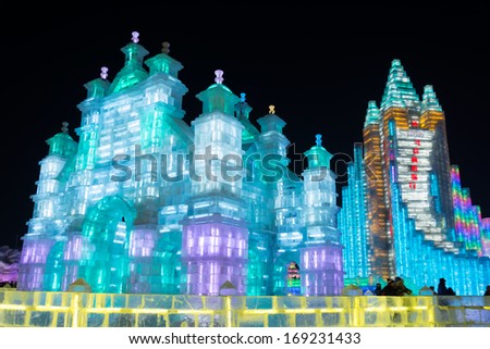 HARBIN, CHINA - DECEMBER 30, 2013: Ice building in Harbin Ice and Snow World. December 30, 2013 in Harbin City, Heilongjiang Province, China.