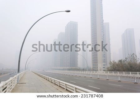 City in a heavy hazy weather. The deterioration of air quality resulted in low horizontal visibility. Located in Sanhao Bridge, Shenyang City, Liaoning Province, China.