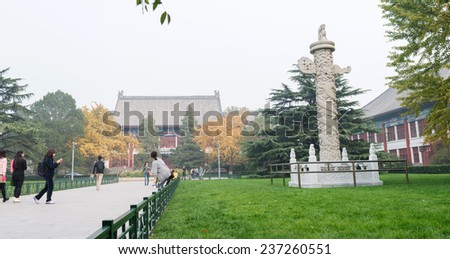 BEIJING, CHINA - OCTOBER 24, 2014: Traditional Chinese buildings in a heavy hazy weather. Located in Peking University, Beijing, China.