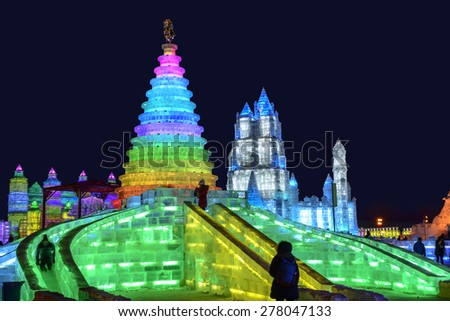 Harbin, China - January 6, 2015: Ice building in Harbin Ice and Snow World. People are visiting. Located in Harbin City, Heilongjiang Province, China.