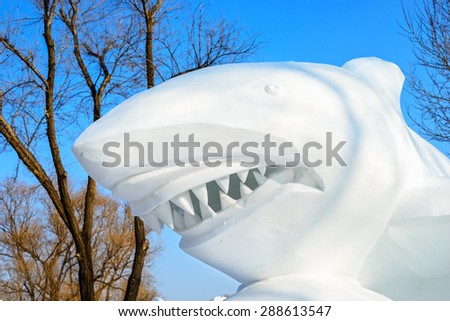 Harbin, China - January 11, 2015: Shark sculpture. 27th China Harbin Sun Island International Snow Sculpture Art Expo. Located in Harbin City, Heilongjiang Province, China.