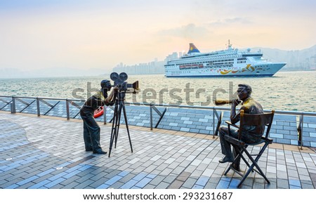 Hong Kong - February 9, 2015: Sculpture in Avenue of Stars. Early morning. In the distance is Victoria Harbour. Located in the Avenue of Stars, Hong Kong.