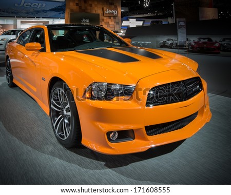 DETROIT, MI/USA - JANUARY 15: A 2014 Dodge Charger Super Bee car at the North American International Auto Show (NAIAS) on January 15, 2014, in Detroit, Michigan.