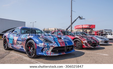ROYAL OAK, MI/USA - AUGUST 13, 2015: Three Team Guess Dodge Vipers at the Woodward Dream Cruise. Woodward is a National Scenic Byway.