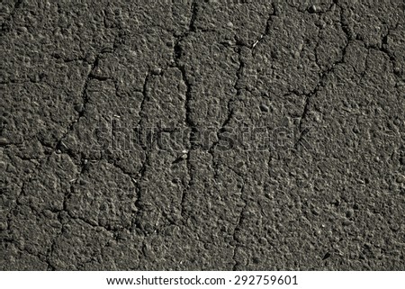 The texture of fresh asphalt lined up close. Pavement.