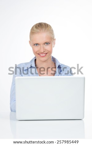 beautiful woman communicates on web chat with her fashion laptop