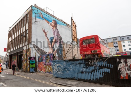 LONDON, UNITED KINGDOM - APRIL 18, 2014: Shoreditch, in the heart of the trendy East End of London, has become synonymous with the UK street art scene, attracting visitors from all over the world.