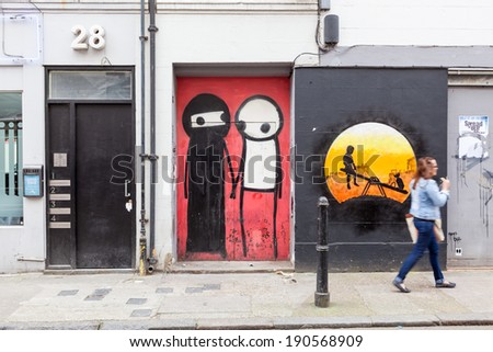 LONDON, UNITED KINGDOM - APRIL 18, 2014: Shoreditch, in the heart of the trendy East End of London, has become synonymous with the UK street art scene, attracting visitors from all over the world.