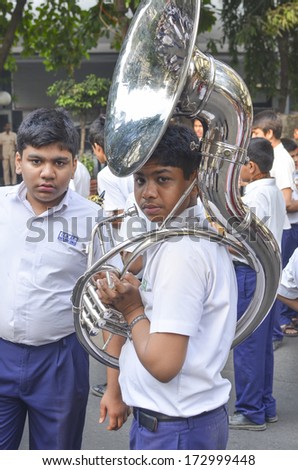MUMBAI, INDIA - JAN 23, 2014 - Students parading near Marine Drive  during the rehearsal on 23 January 2014 for India\'s Republic Day to be held on 26 January 2014
