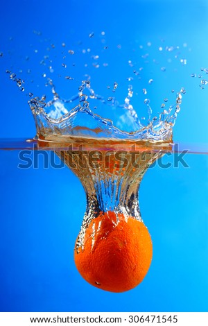 Splashing fruit on water