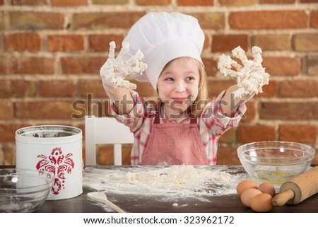 young chefs, baking a cake