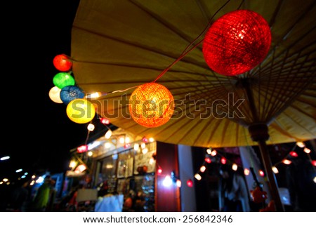 Small colorful lanterns at night market.