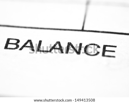 Printed word BALANCE closeup on a spreadsheet.