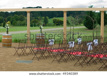 Chairs set out for an impending outdoor wedding