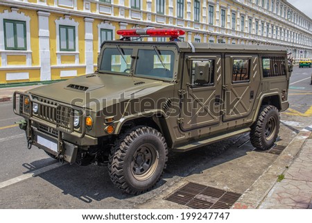 BANGKOK, THAILAND - JUNE 18 : army jeep on the road in front of the Interior Ministry on june 18, 2014 at Bangkok Thailand.