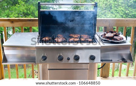 Pork steaks on gas grill