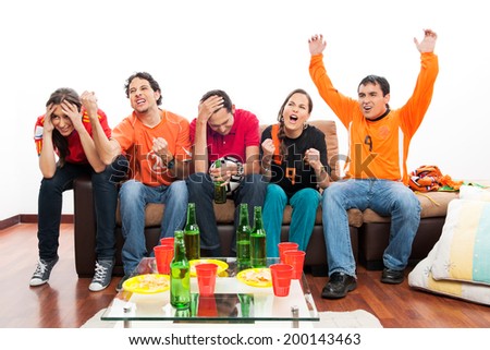 Group of friends celebrating football / soccer match