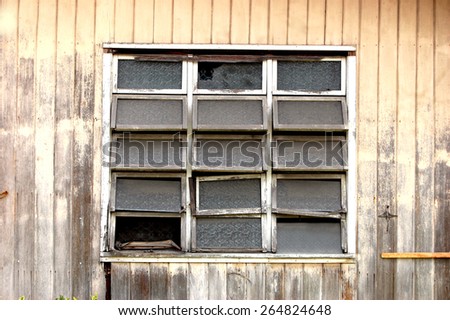 Old damaged awning windows