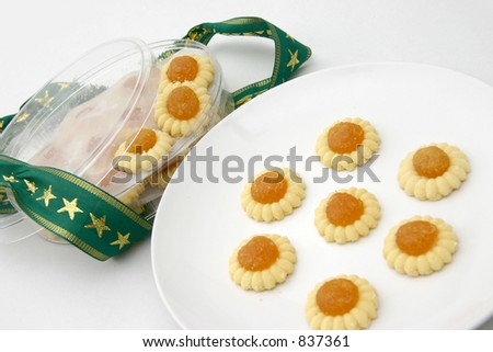 Pineapple Tarts served on a smooth white porcelain plate