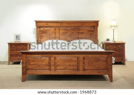 Heavy wood queen-size bed set with headboard and bedside table drawers