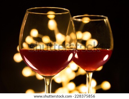2 glasses of red wine. Christmas, romantic, valentine dinner image