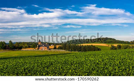 Farm fields and view of a church in rural York County, Pennsylvania.