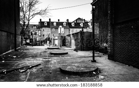 Dirty courtyard and houses in Baltimore, Maryland.