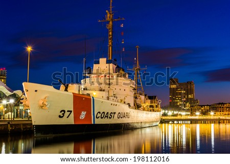 The USGC Taney Coast Guard Cutter at night, in the Inner Harbor of Baltimore, Maryland.