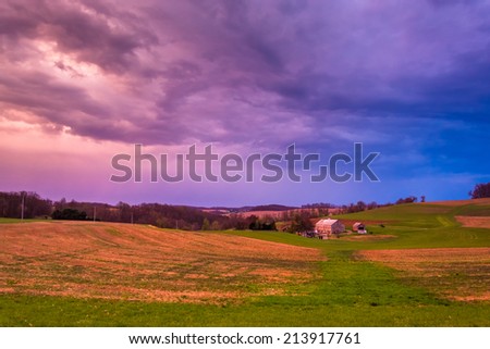 Dramatic sunset sky over a farm in rural York County, Pennsylvania.