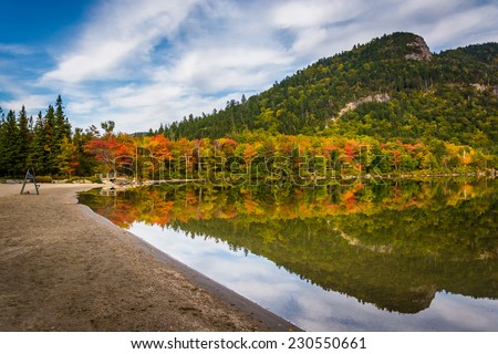 Early fall colors and reflections at Echo Lake,  in Franconia Notch State Park, New Hampshire.