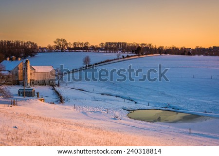 View of a barn on a snow-covered farm in rural York County, Pennsylvania.