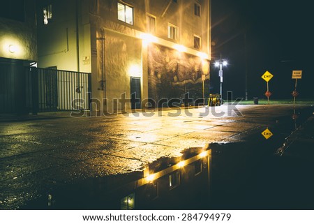 A dark street at night, in Venice Beach, Los Angeles, California.